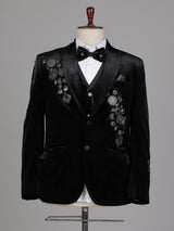 Black velvet tuxedo suit with crystal floral embellishments