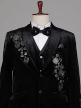 Black velvet tuxedo suit with crystal floral embellishments