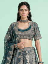 Teal blue banarasi silk lehenga choli with embellished dupatta
