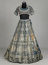Teal blue banarasi silk lehenga choli with embellished dupatta