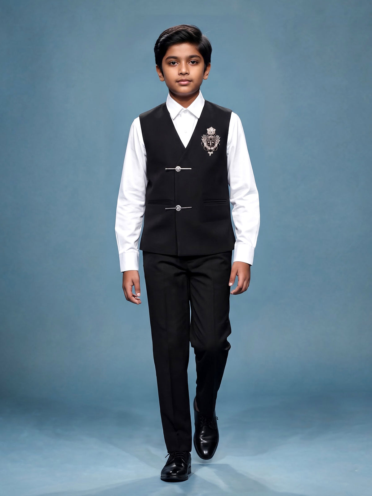 Jet black boys waistcoat suit with zardosi royal crest
