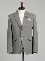 Light grey single-breasted blazer with floral brooch