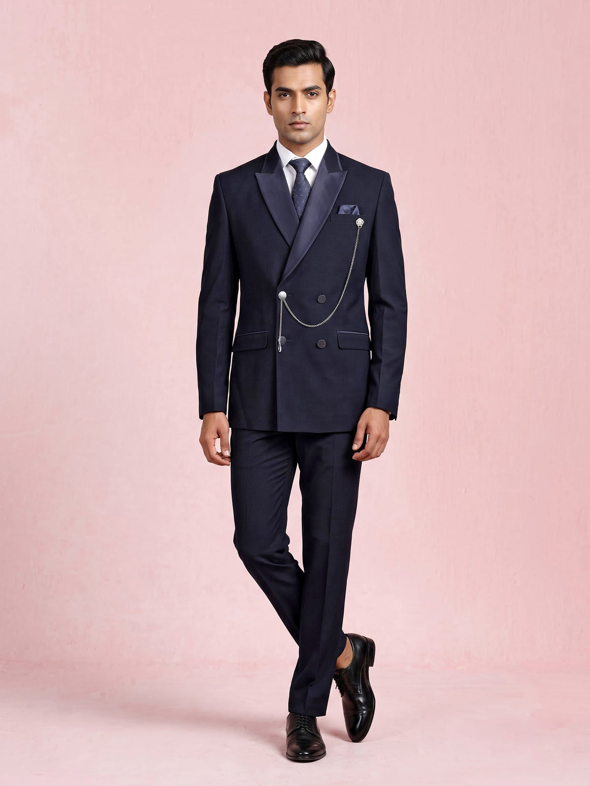 Midnight navy double-breasted tuxedo suit with metallic brooch