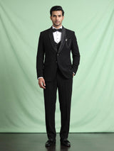 Black three-piece tuxedo suit with crystal bow tie