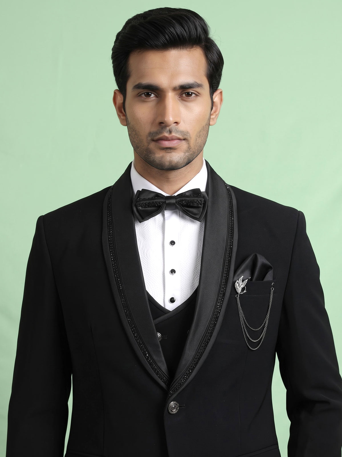 Black three-piece tuxedo suit with crystal bow tie