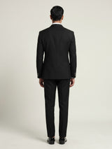 Jet black double-breasted tuxedo suit with crystal-bead piping
