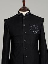 Black embellished tonal crest motif indowestern suit for mens