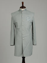 Pista green embellished crest motif indowestern suit for mens