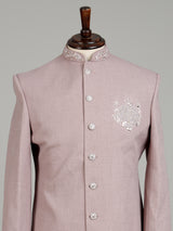 Dusty rose pink embellished crest motif indowestern suit for mens