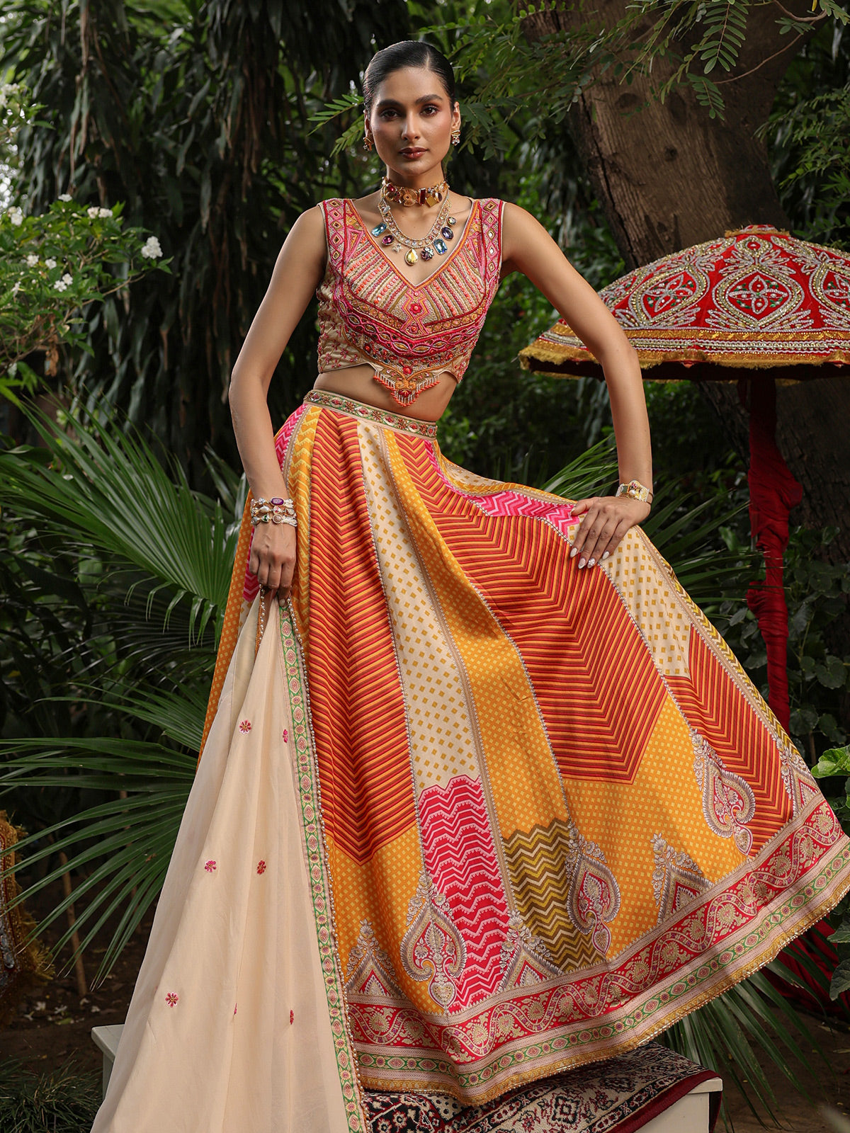 Multicolor geometric print lehenga choli with heavy embellished blouse