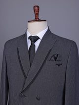 Charcoal grey double-breasted suit with black satin lapels