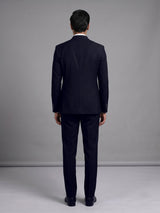 Black terry rayon double-breasted tuxedo suit with crystal brooch