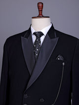 Black terry rayon double-breasted tuxedo suit with crystal brooch