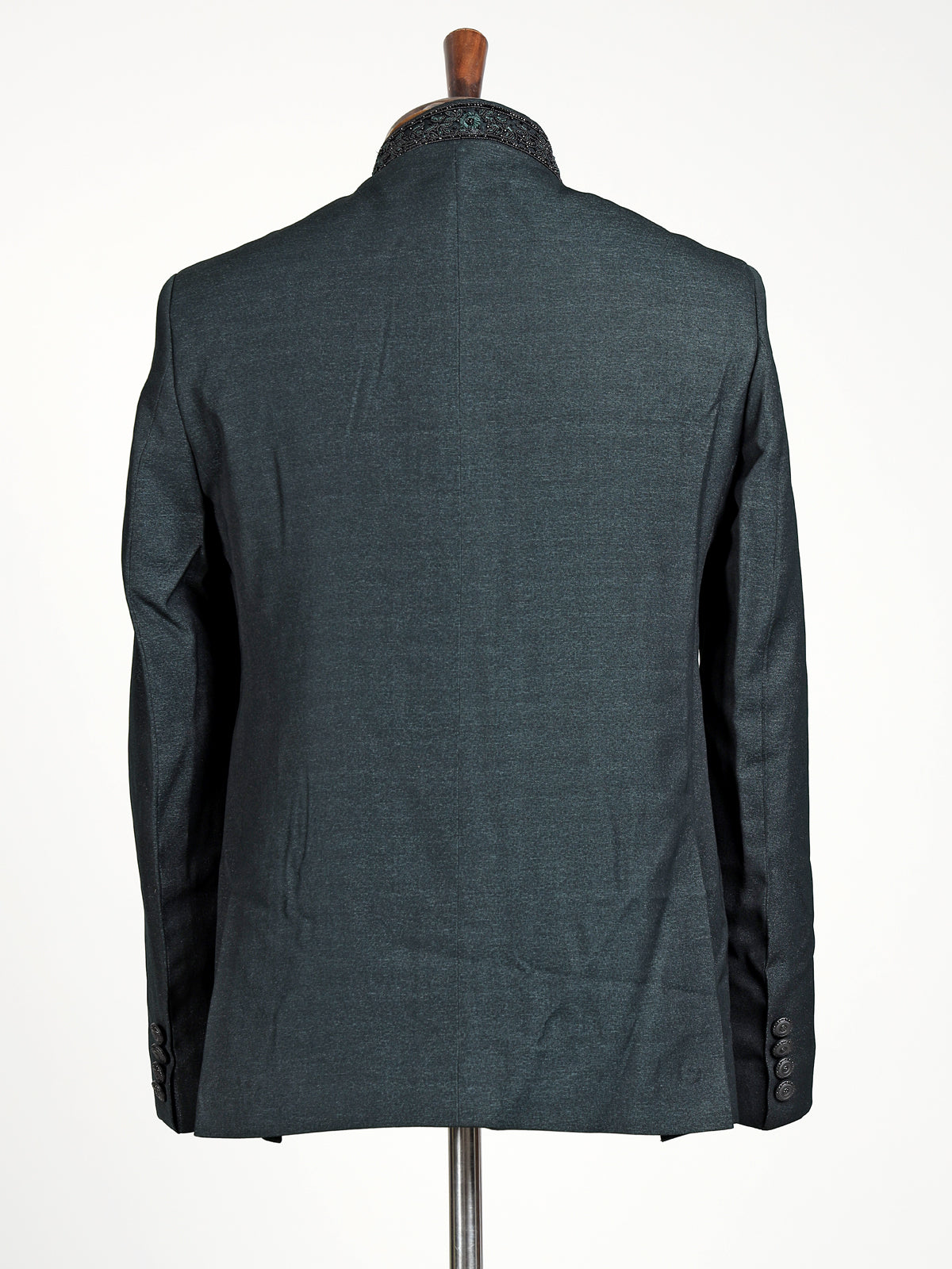 Deep emerald green textured jodhpuri suit for mens with crest