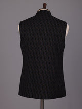 Black jacquard textured waistcoat with tonal metallic buttons for mens