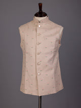 Light peach textured butti waistcoat with metallic buttons for mens