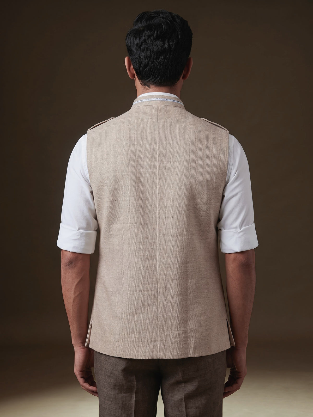 Beige textured waistcoat with metallic chain brooch detailing for mens