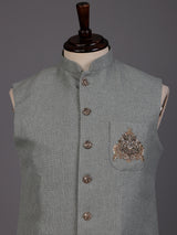Grey textured safari waistcoat with zardosi embellished chest pocket