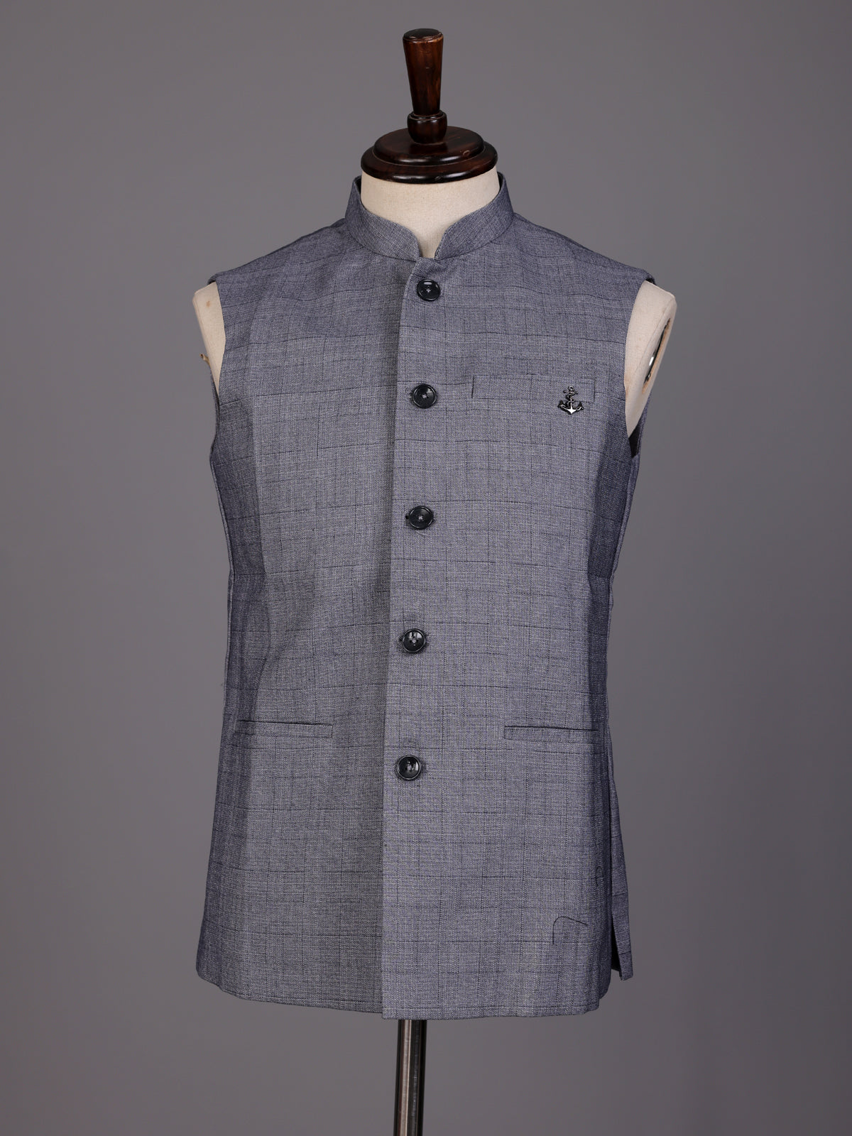 Grey micro-textured waistcoat with metallic brooch for mens weddings