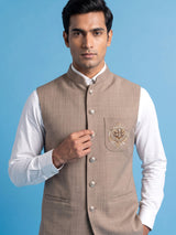 Dark beige textured waistcoat with zardosi safari pocket detailing