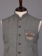 Grey textured zardosi waistcoat with safari pocket detailing for mens