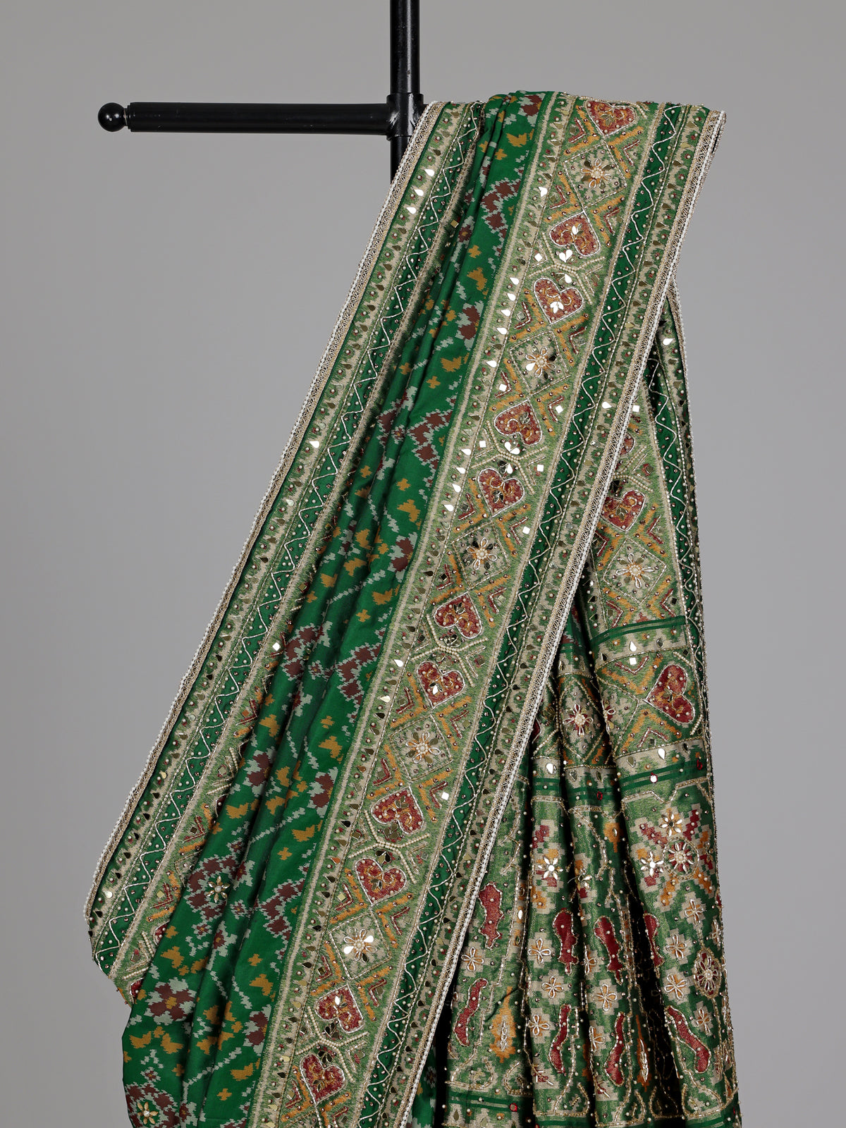 Emerald green semi silk Patola motif zardosi saree