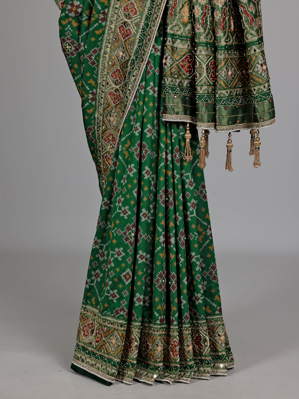 Emerald green semi silk Patola motif zardosi saree