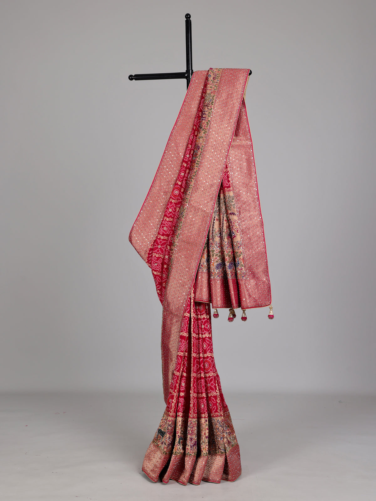 Rani pink Bandhani pattern figurative embroidered festive saree