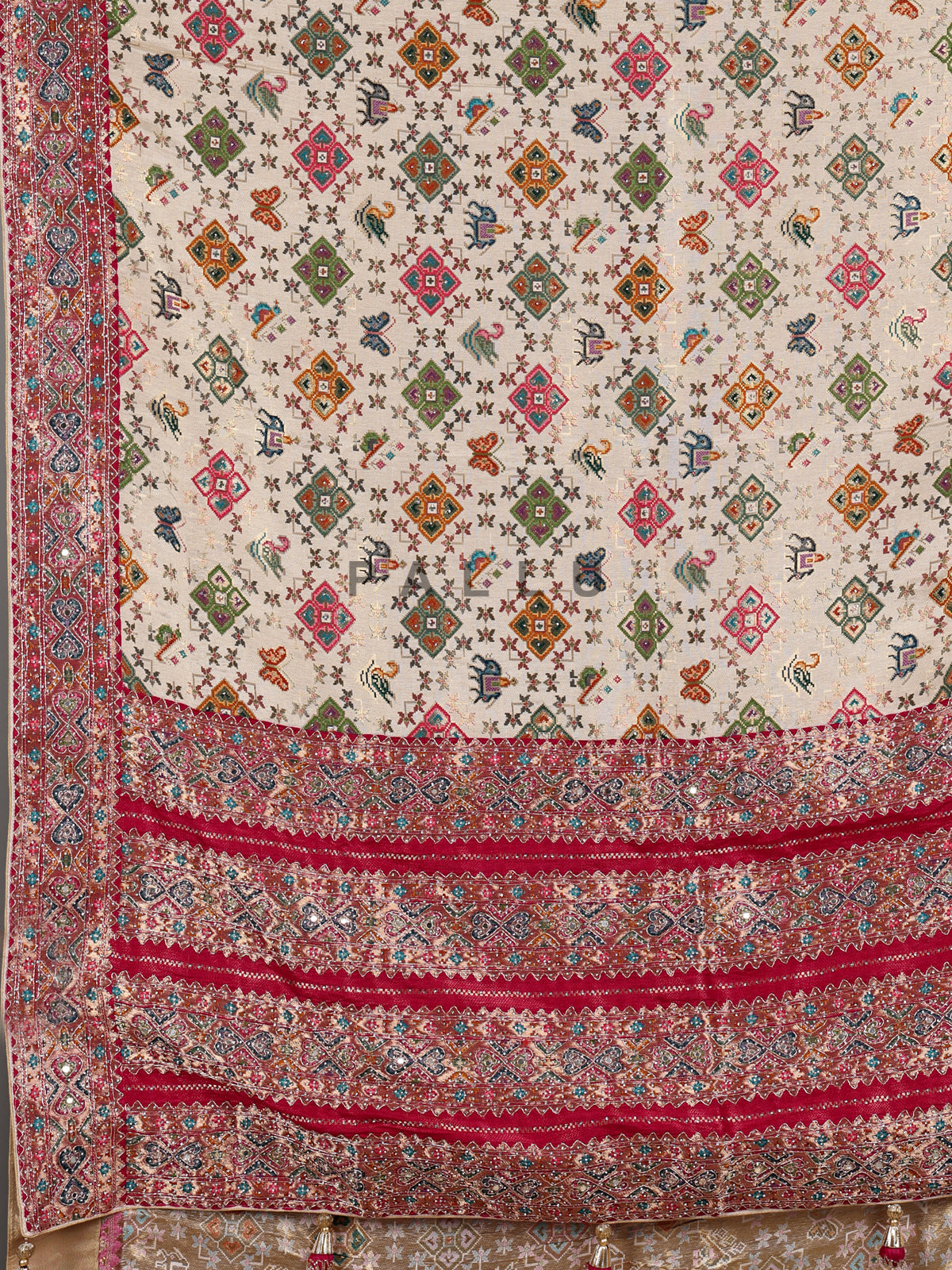 Beige modal silk Patola motif magenta zari border saree