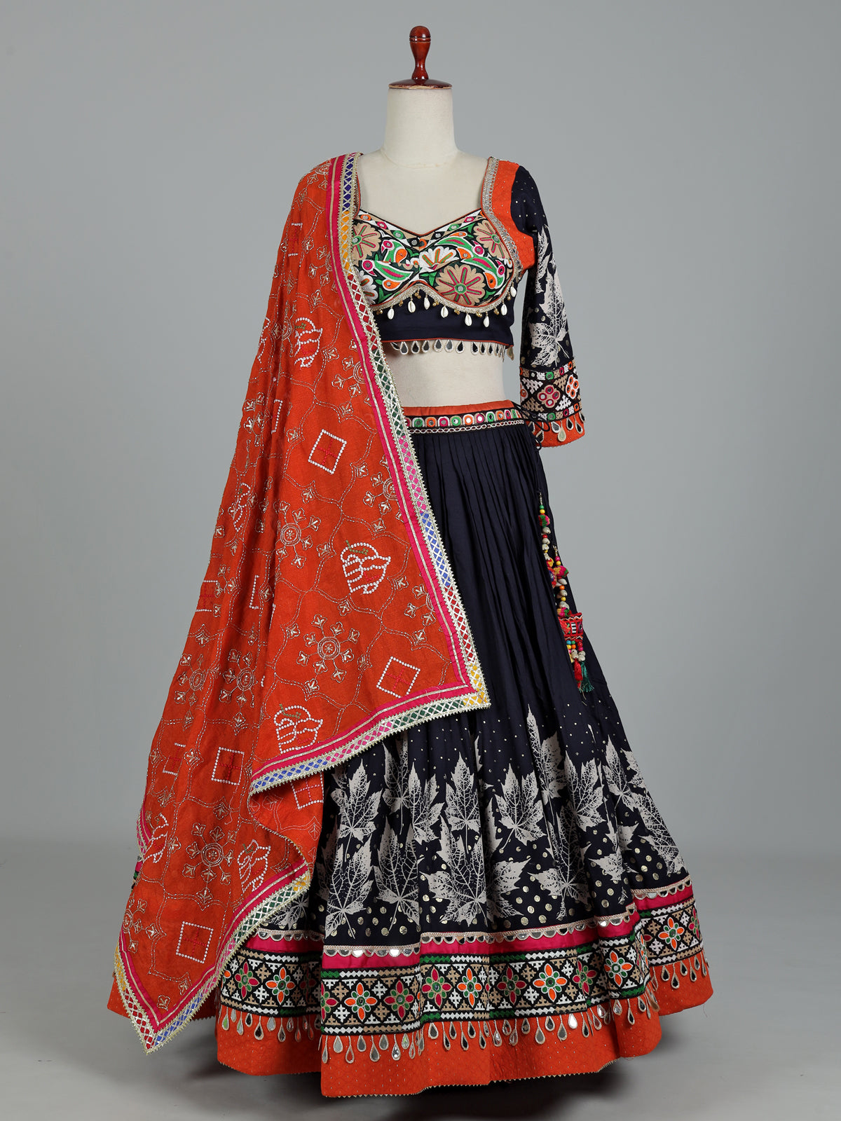 Black cotton silk chaniya choli with mirror and cowrie work