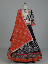 Black cotton silk chaniya choli with mirror and cowrie work
