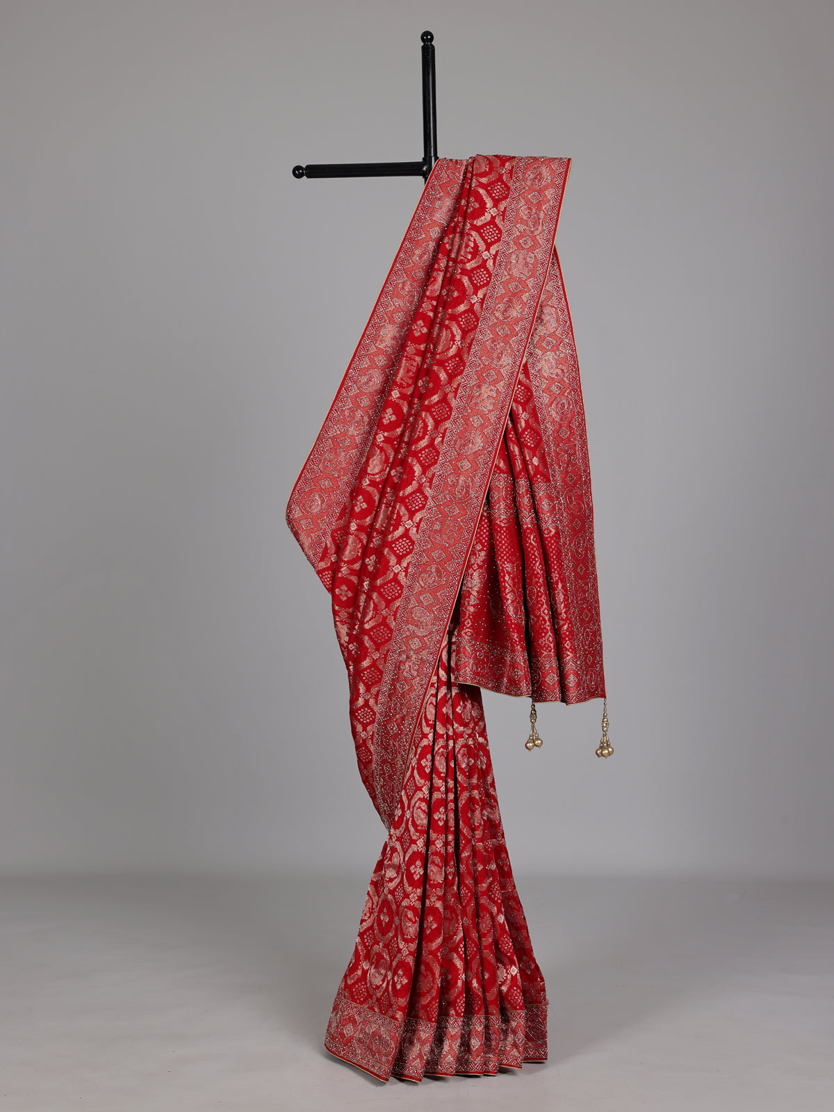 Crimson red metallic dola silk saree