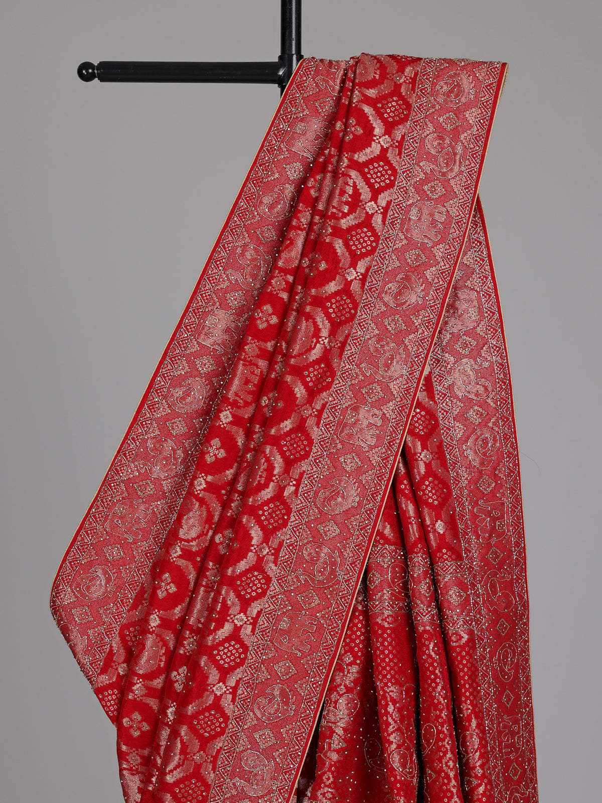 Crimson red metallic dola silk saree