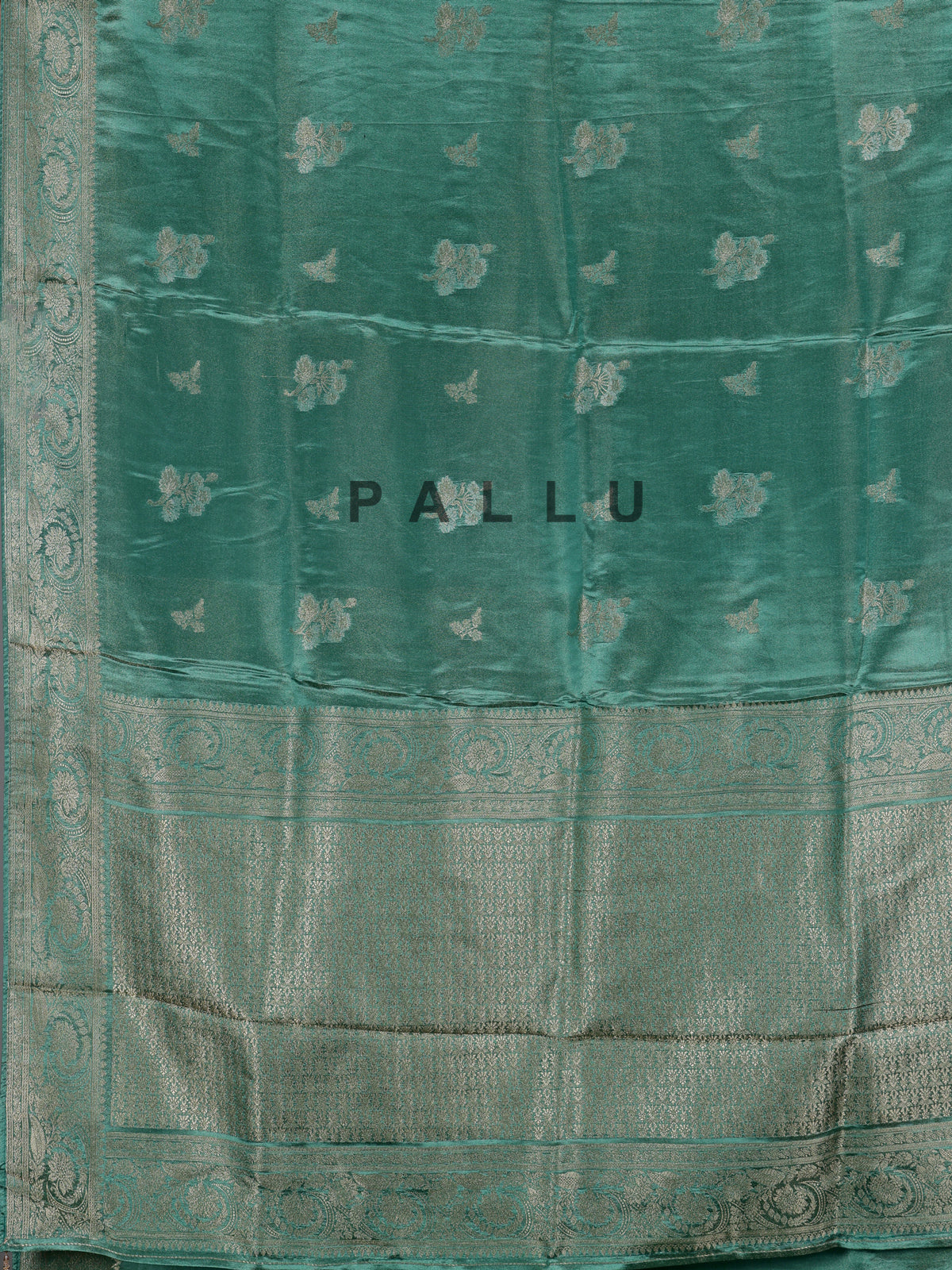 Rama green metallic tissue-silk saree with readymade blouse
