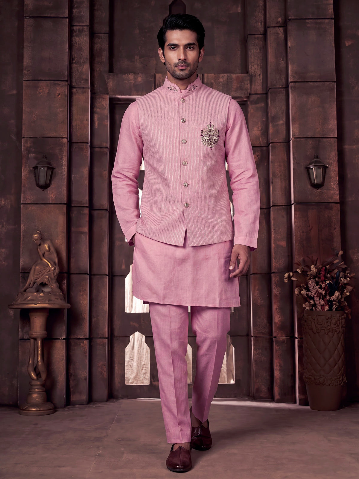 Pink zardosi embellished waistcoat set with royal crest for mens