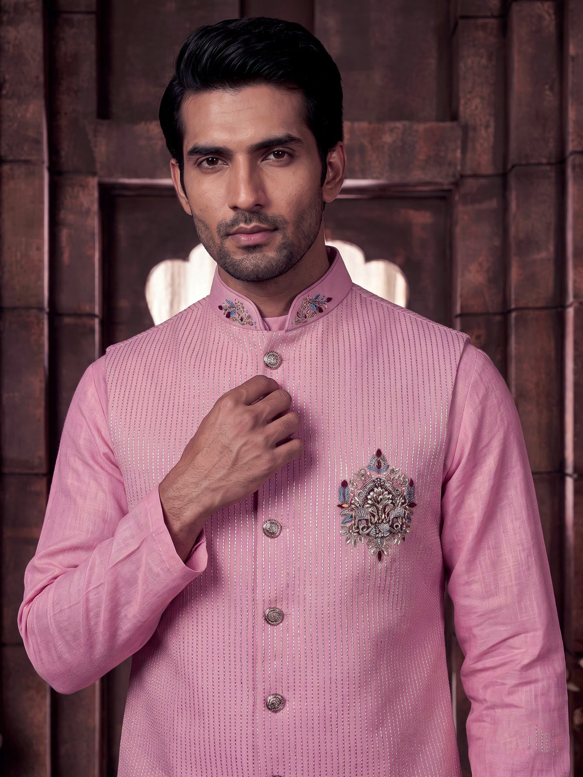 Pink zardosi embellished waistcoat set with royal crest for mens