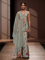 Pista green floral silk palazzo suit with mirror and zardosi detailing