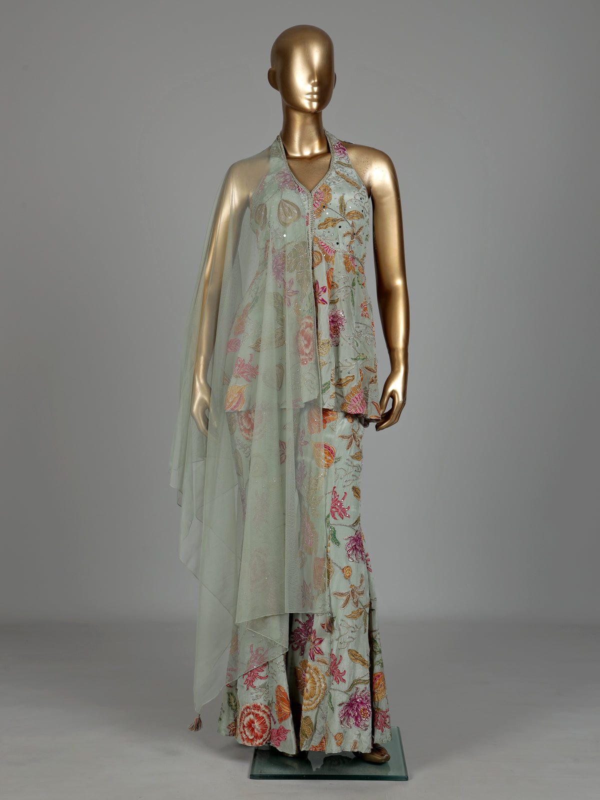 Pista green floral silk palazzo suit with mirror and zardosi detailing