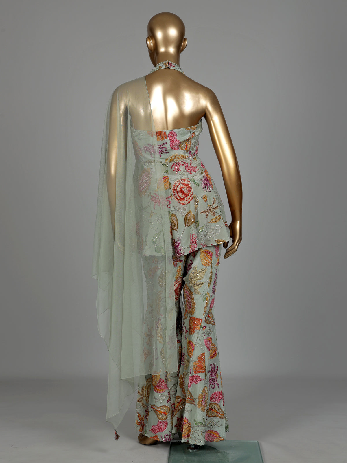 Pista green floral silk palazzo suit with mirror and zardosi detailing