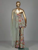 Pista green floral silk palazzo suit with mirror and zardosi detailing