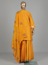Mustard yellow silk sharara suit with animal motifs and gota work