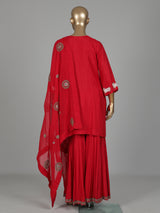 Red silk sharara suit with animal motifs, zardosi and gota detailing