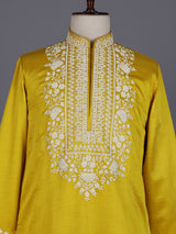 Mustard yellow silk kurta suit with ornate embellished yoke