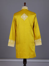 Mustard yellow silk kurta suit with ornate embellished yoke