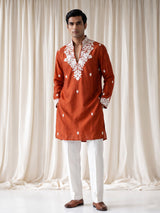 Rust orange silk kurta suit with floral bead embellishments