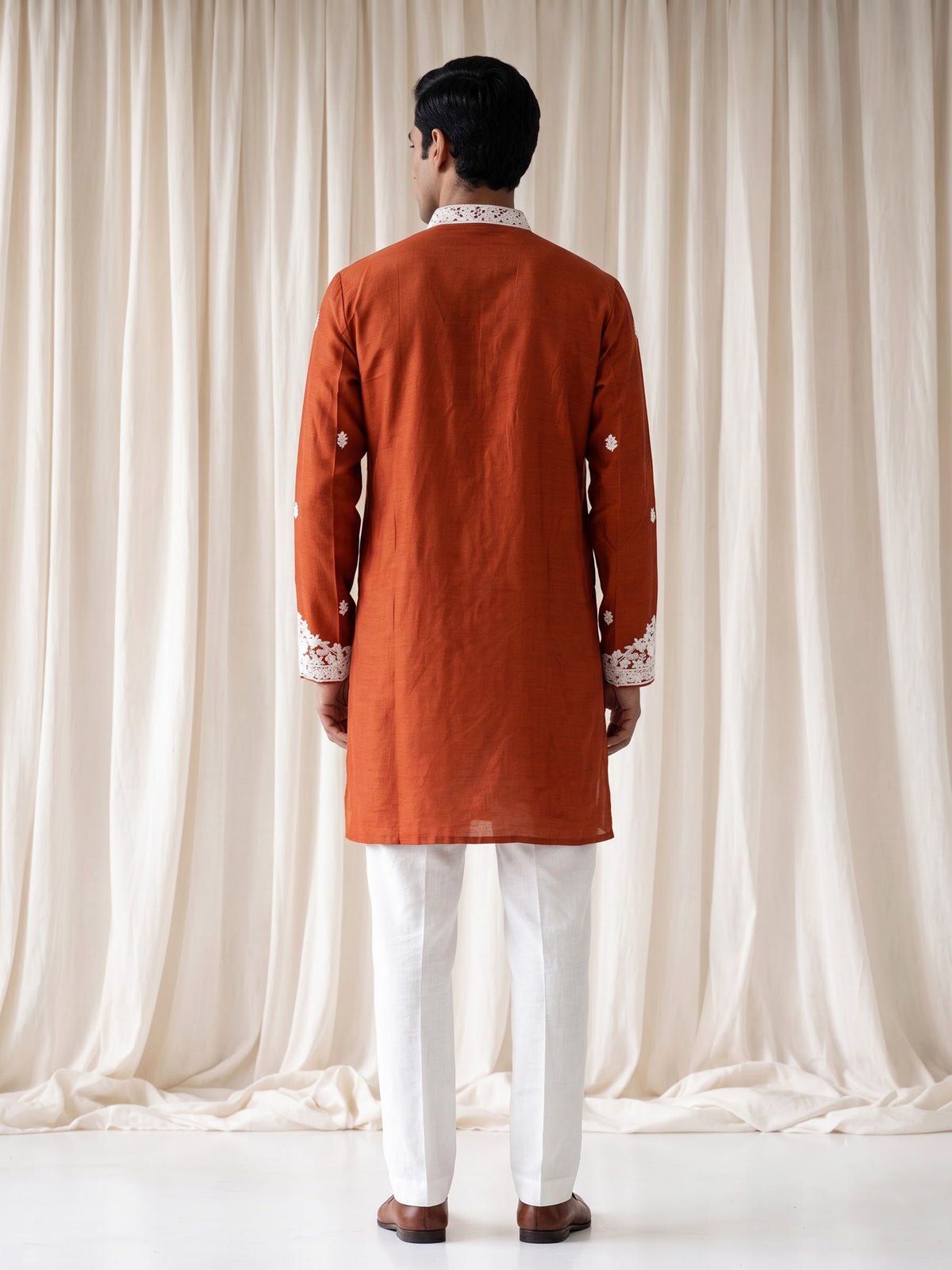 Rust orange silk kurta suit with floral bead embellishments