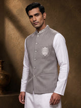 Grey and white textured cotton-silk waistcoat set with ornate buttons
