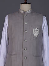 Grey and white textured cotton-silk waistcoat set with ornate buttons