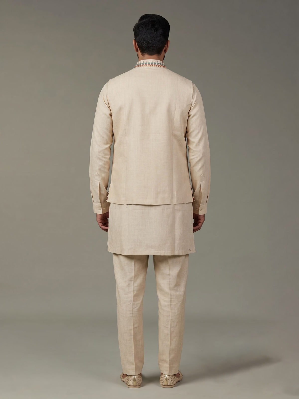 Beige printed silk waistcoat set with multicolor floral embellishments