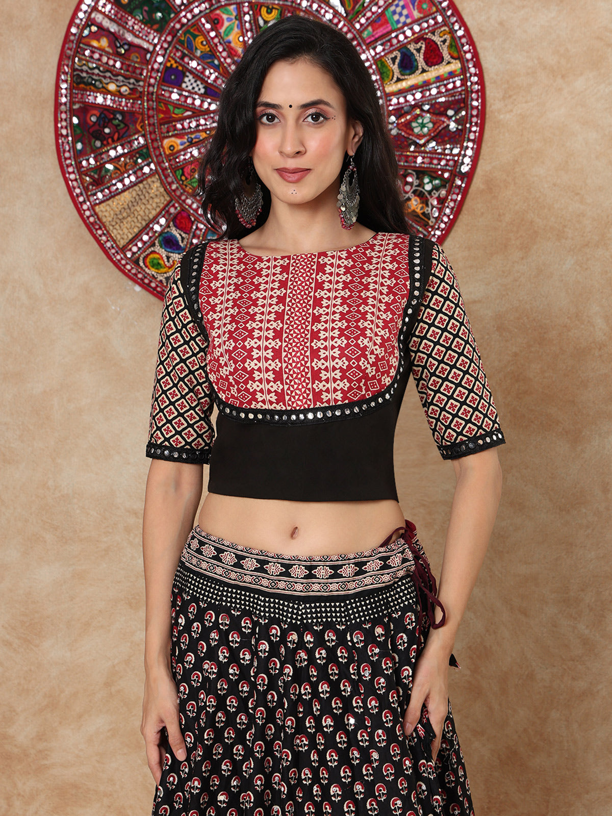 Black printed aabla work boat neck elbow sleeve blouse design